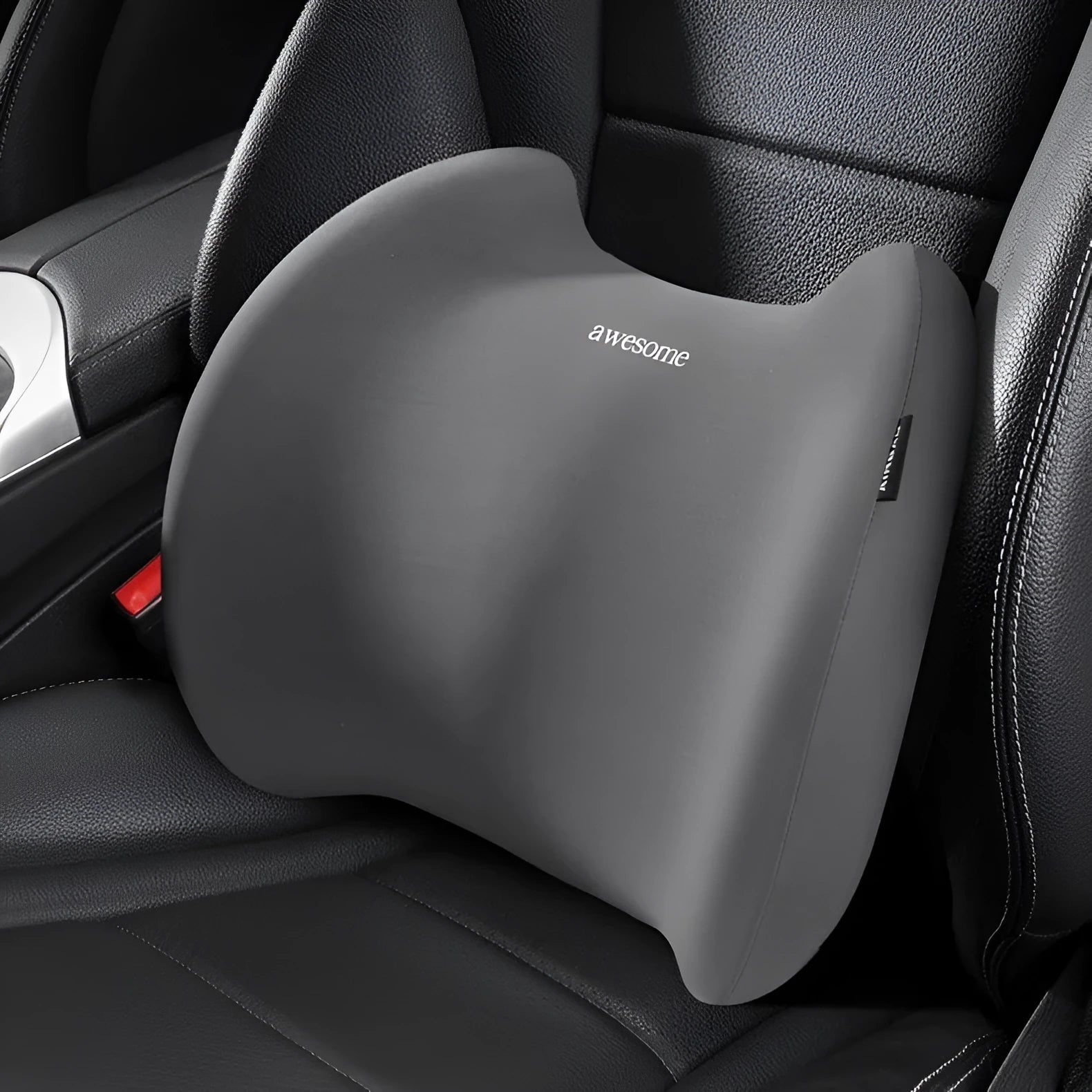 Black and blue ice silk car headrest pillow and matching lumbar support cushion on a car seat.