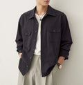 Men's light sand rice long sleeve casual shirt with a lapel collar, laid flat.