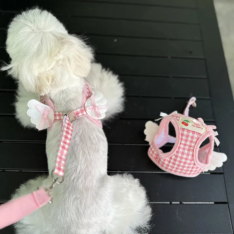 Pink cotton chest and back dog harness with lead for a small dog, size label shown.