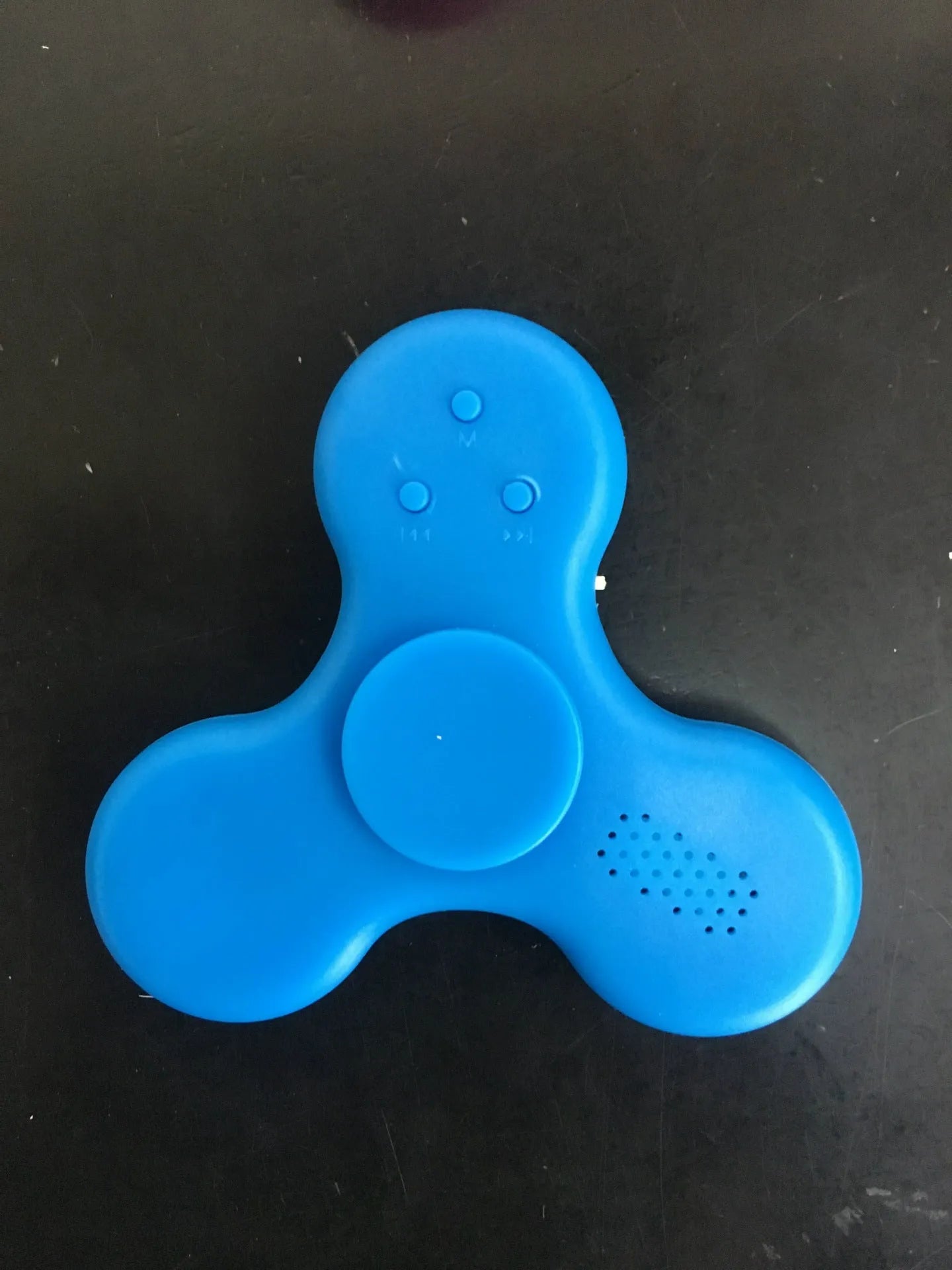 Bluetooth speaker fidget spinner in ABS plastic with 80mm diameter, shown in blue colour option