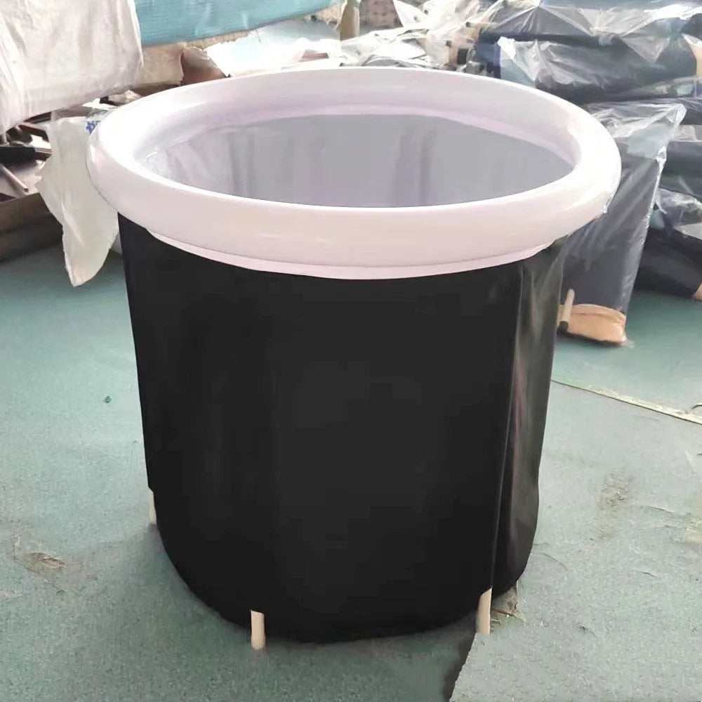 Black inflatable PVC portable ice bath tub with insulation and a fitted weather lid.