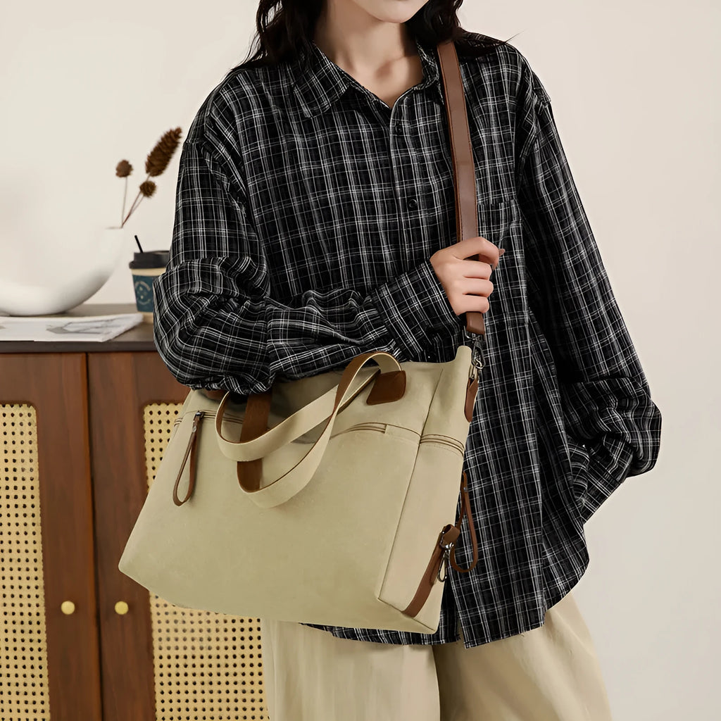 Women's retro style canvas shoulder bag in horizontal square shape with organisational compartments