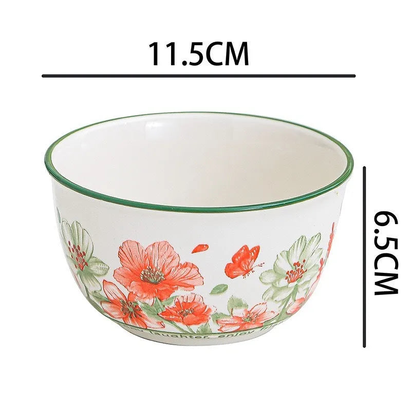 Ceramic tableware gift box set with 4 bowls, 4 spoons, and 2 plates in matching underglaze finish