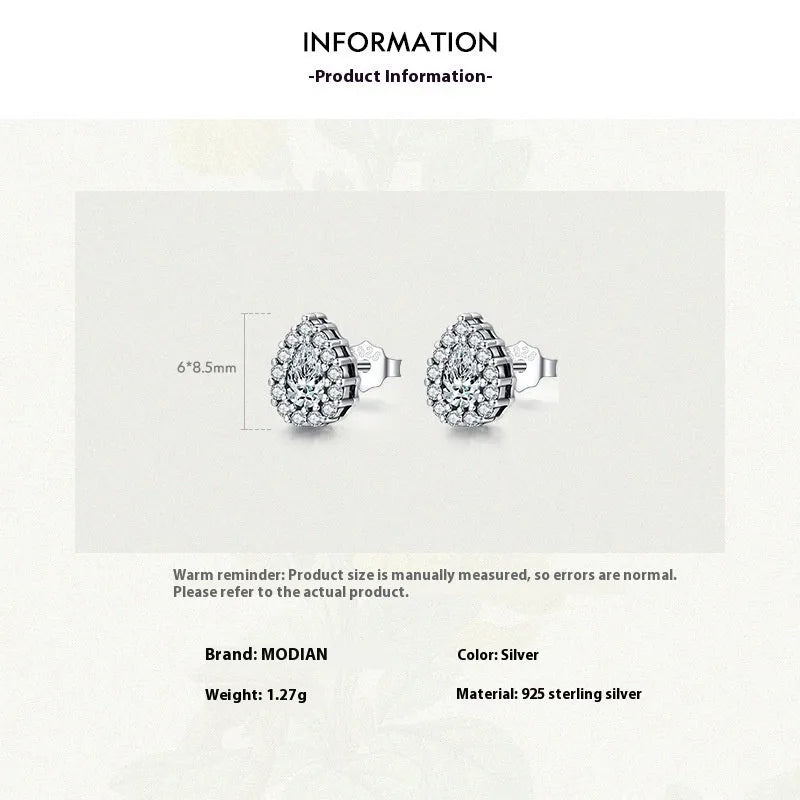 Silver drop shape ear studs made from 925 sterling silver with diamond-treated finish