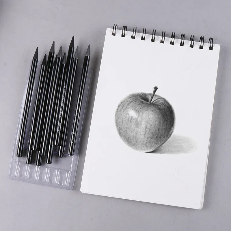 A pack of wooden graphite and carbonised drawing pencils on a suction card.