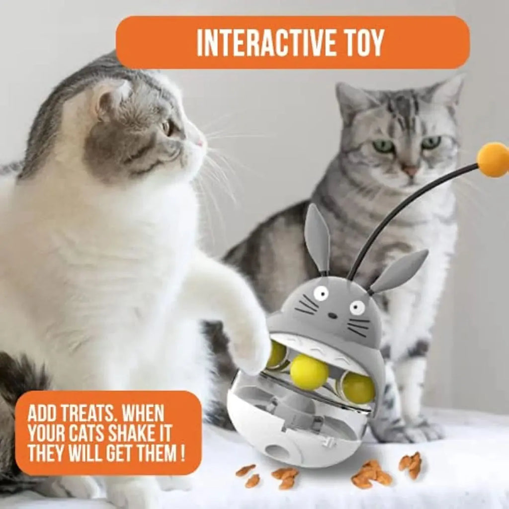Interactive cat feeder toy treat dispenser with sounding bell in brown colour for indoor cat exercise