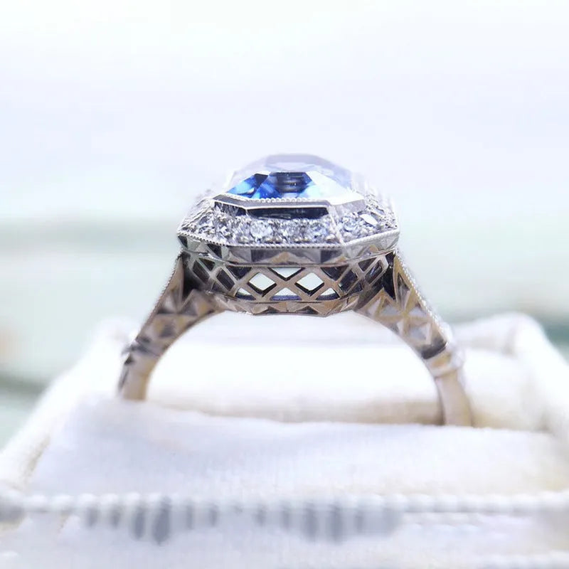 Fashion long hexagonal blue metal women's ring made of copper with electroplated finish, front view