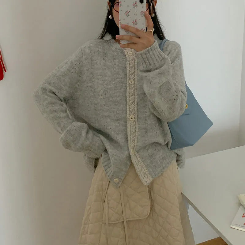 Artistic retro loose-fit sweater coat cardigan in apricot, shown on a model.