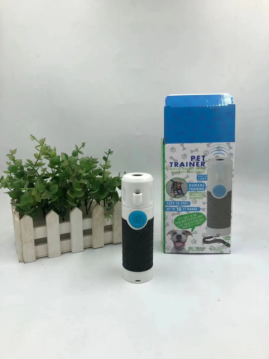 White ABS plastic handheld ultrasonic dog trainer for bark control