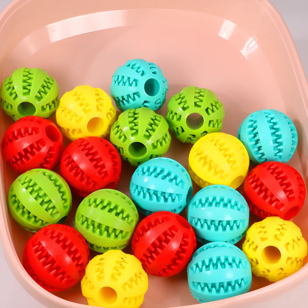 Green rubber watermelon ball dog chew toy 6cm diameter on white background