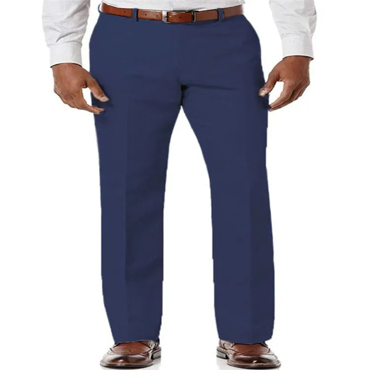 Men's beige linen trousers with slant pockets laid flat on a surface.