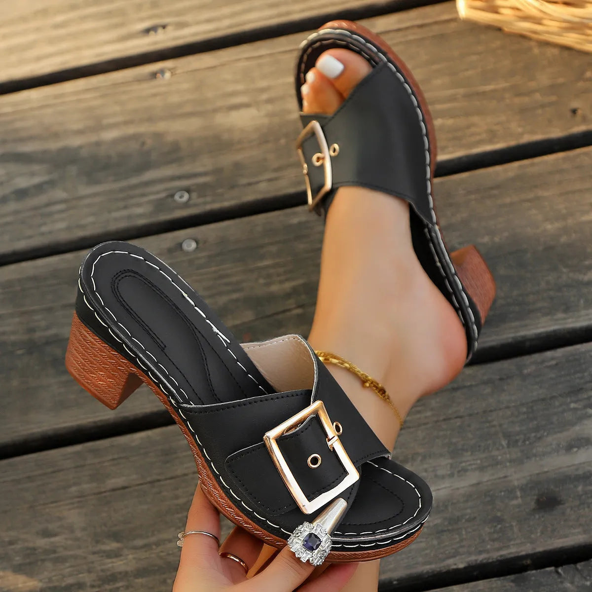 Women's black chunky heel slippers with metal buckle and round toe
