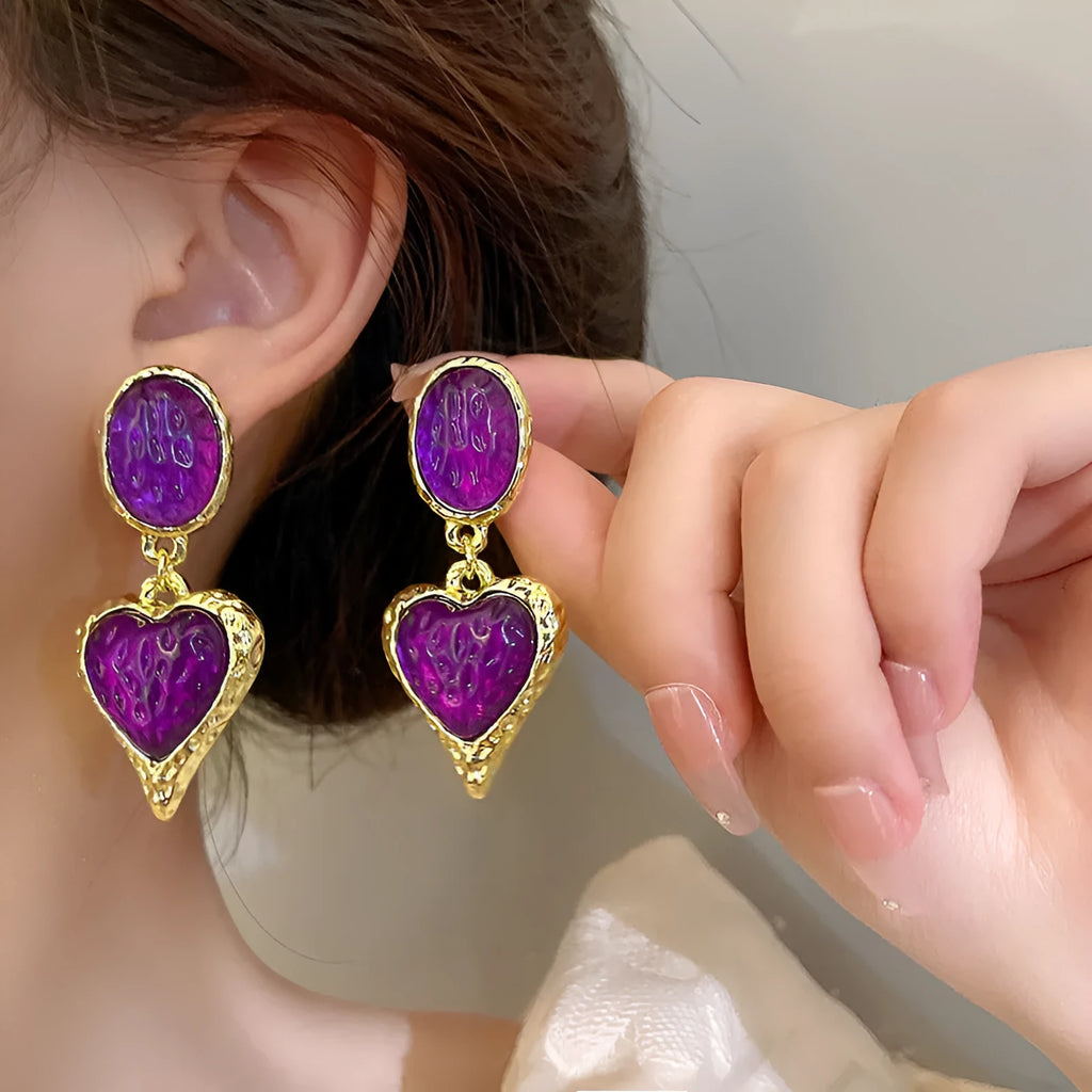 Silver needle pleated oval love heart stud earrings in purple, red, green, and yellow white colour options.