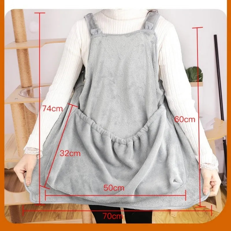 Plush pet carrier apron for small cats and dogs shown in beige, with adjustable neck and head opening.