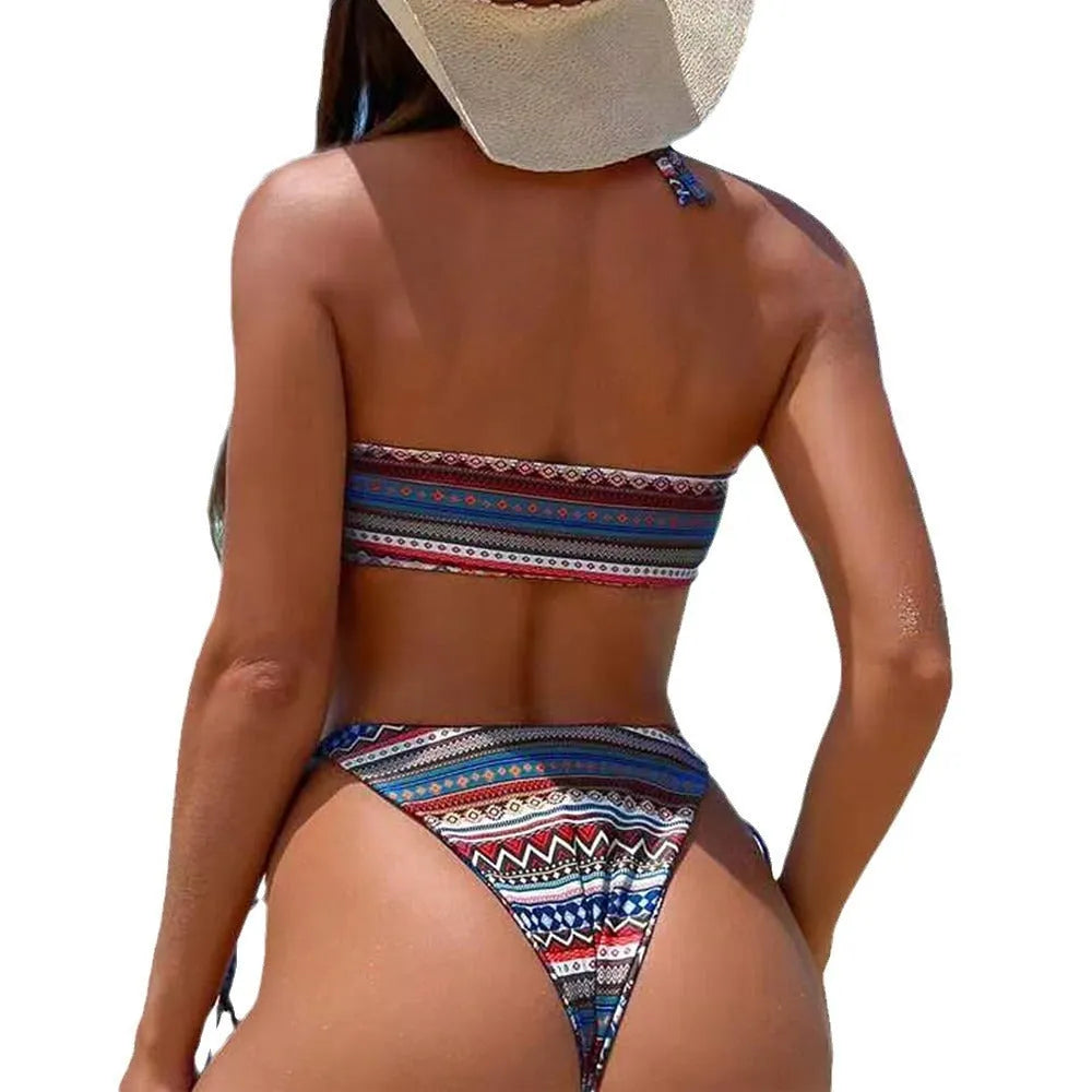 Women's halter neck split bikini swimsuit in polyester fabric with brief style