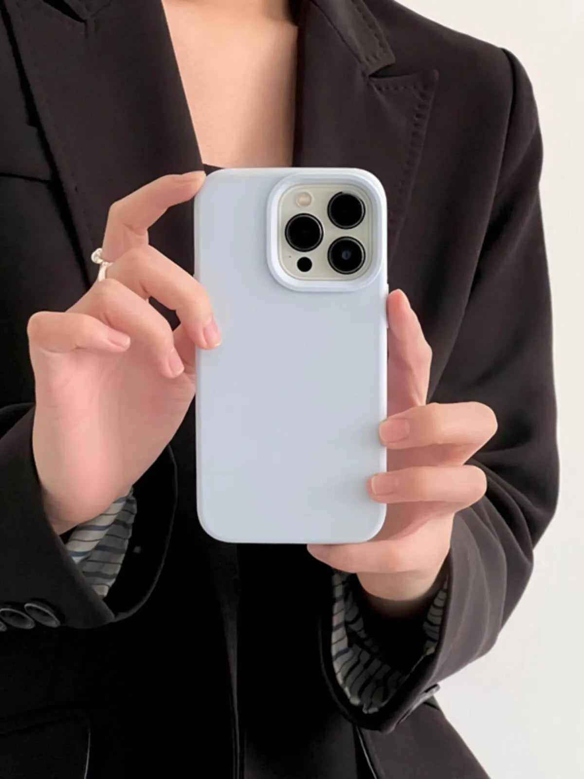 Solid colour liquid silicone phone case in Sapphire Blue for iPhone 14 and iPhone 15 models