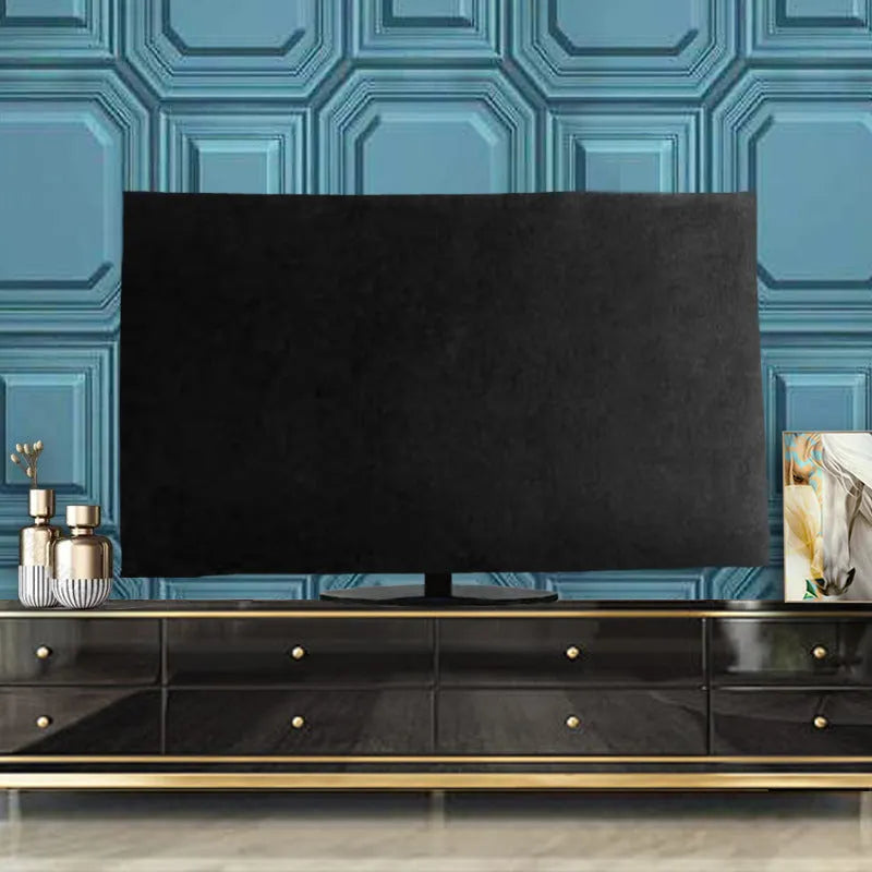 Velvet fabric TV cover in pink, shown draped over a flatscreen television.