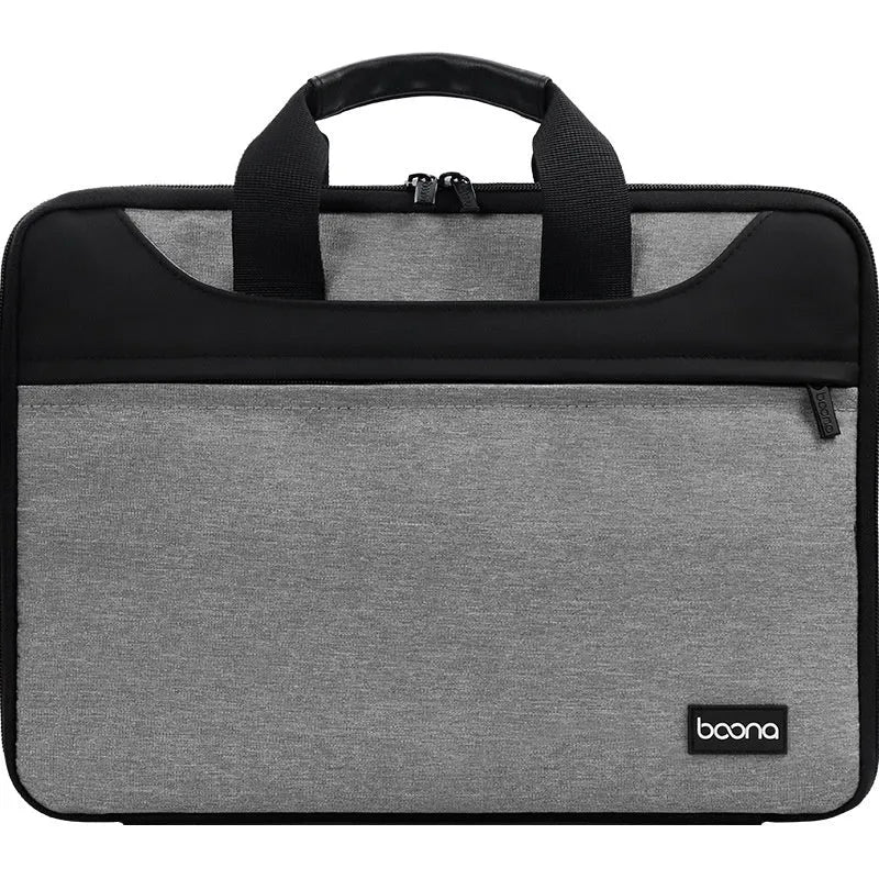 Black Oxford cloth laptop bag with a soft carry handle for business travel.