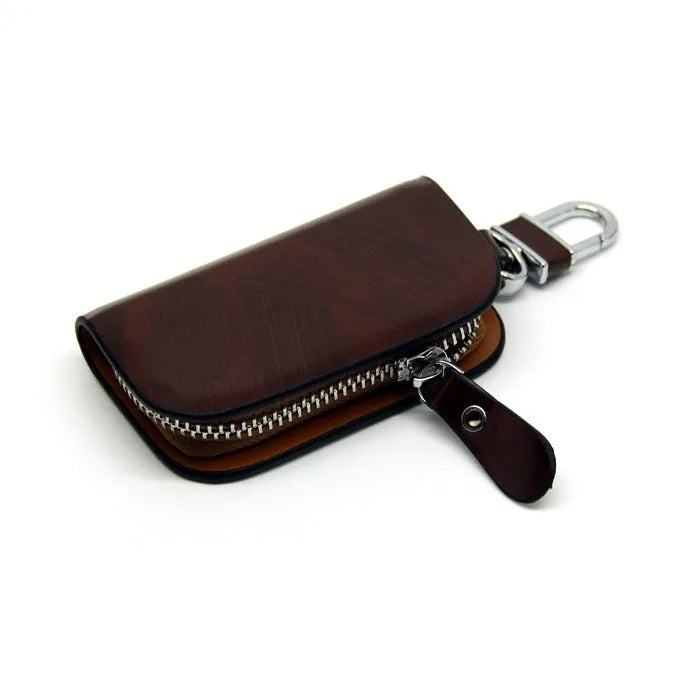 Black genuine cowhide leather car key case with a zip closure.