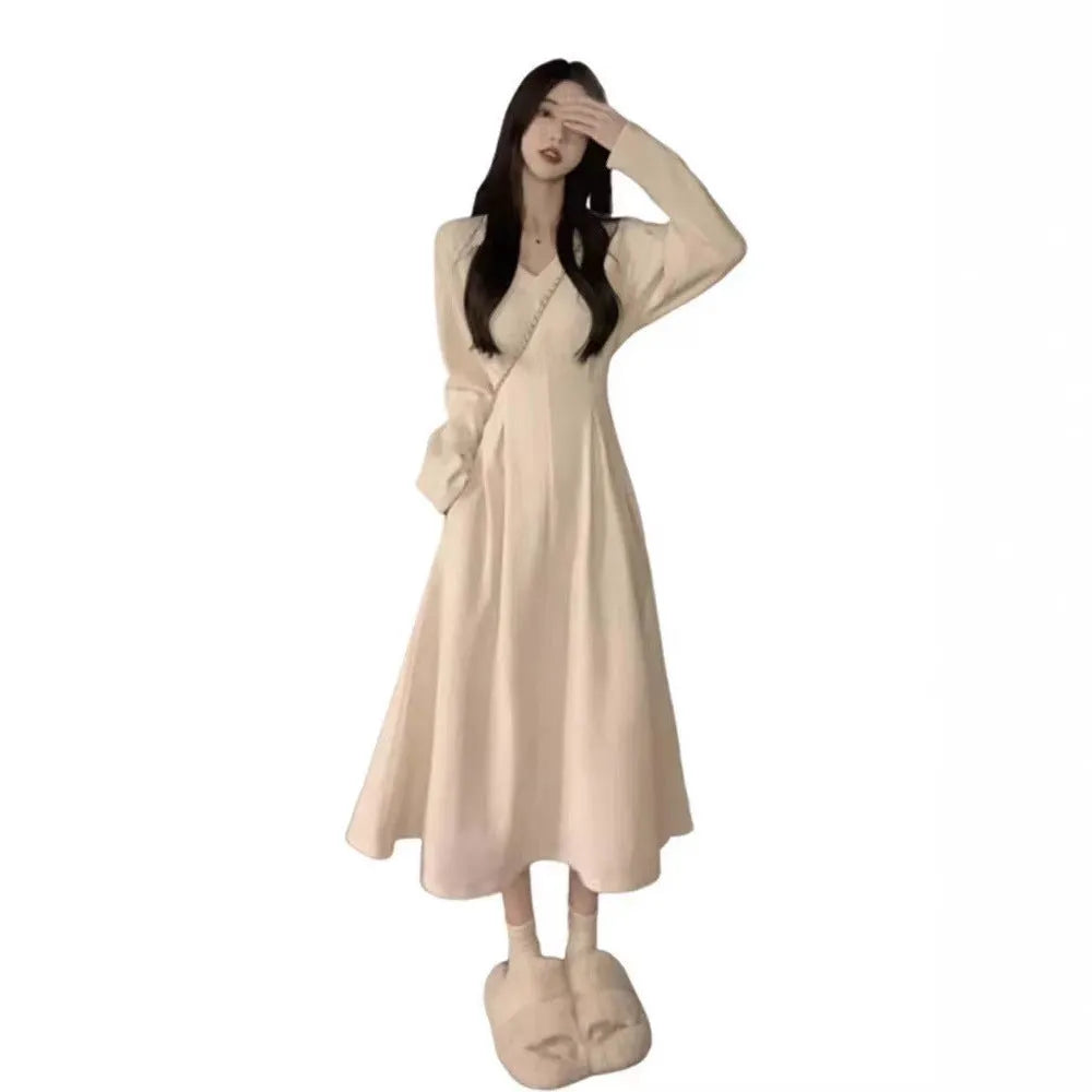 Women's V-neck knitted dress sweater in polyester with long skirt and princess sleeves