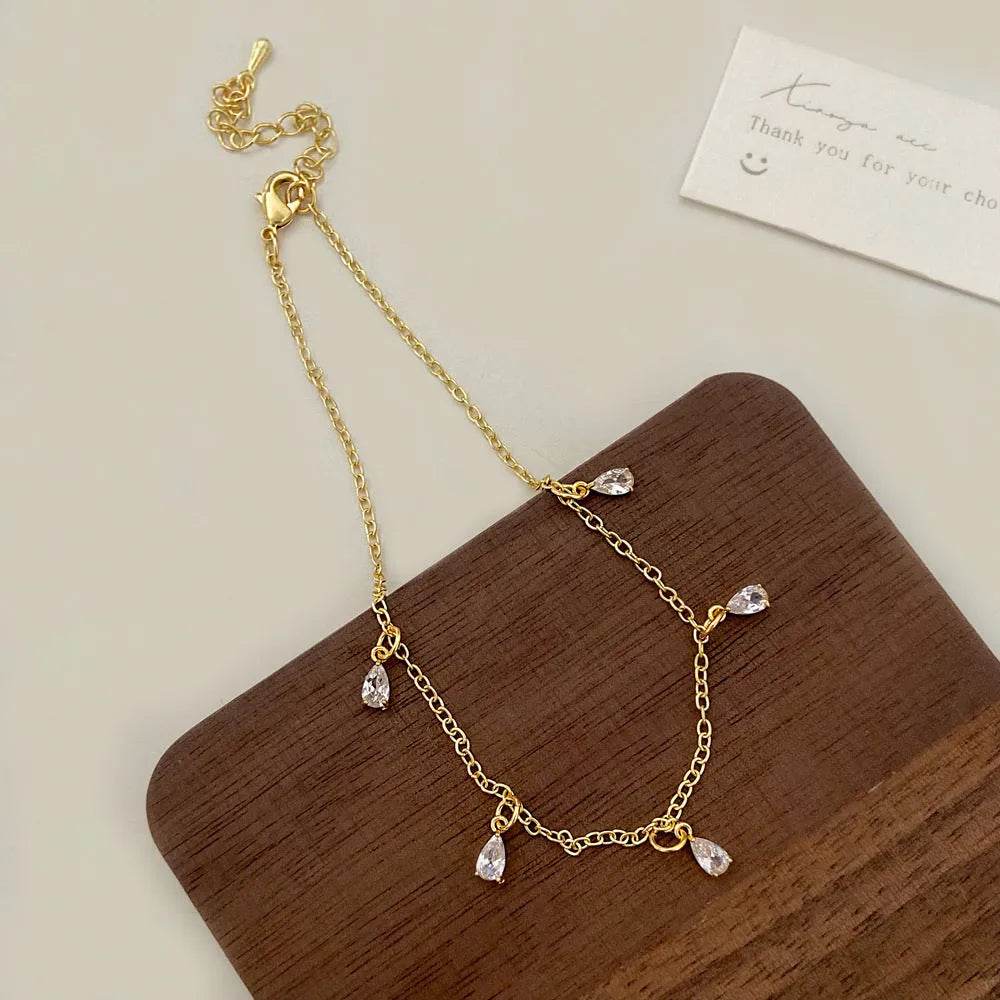 Korean style zircon jewellery set with necklace, earrings, and anklet featuring geometric meteor shower design