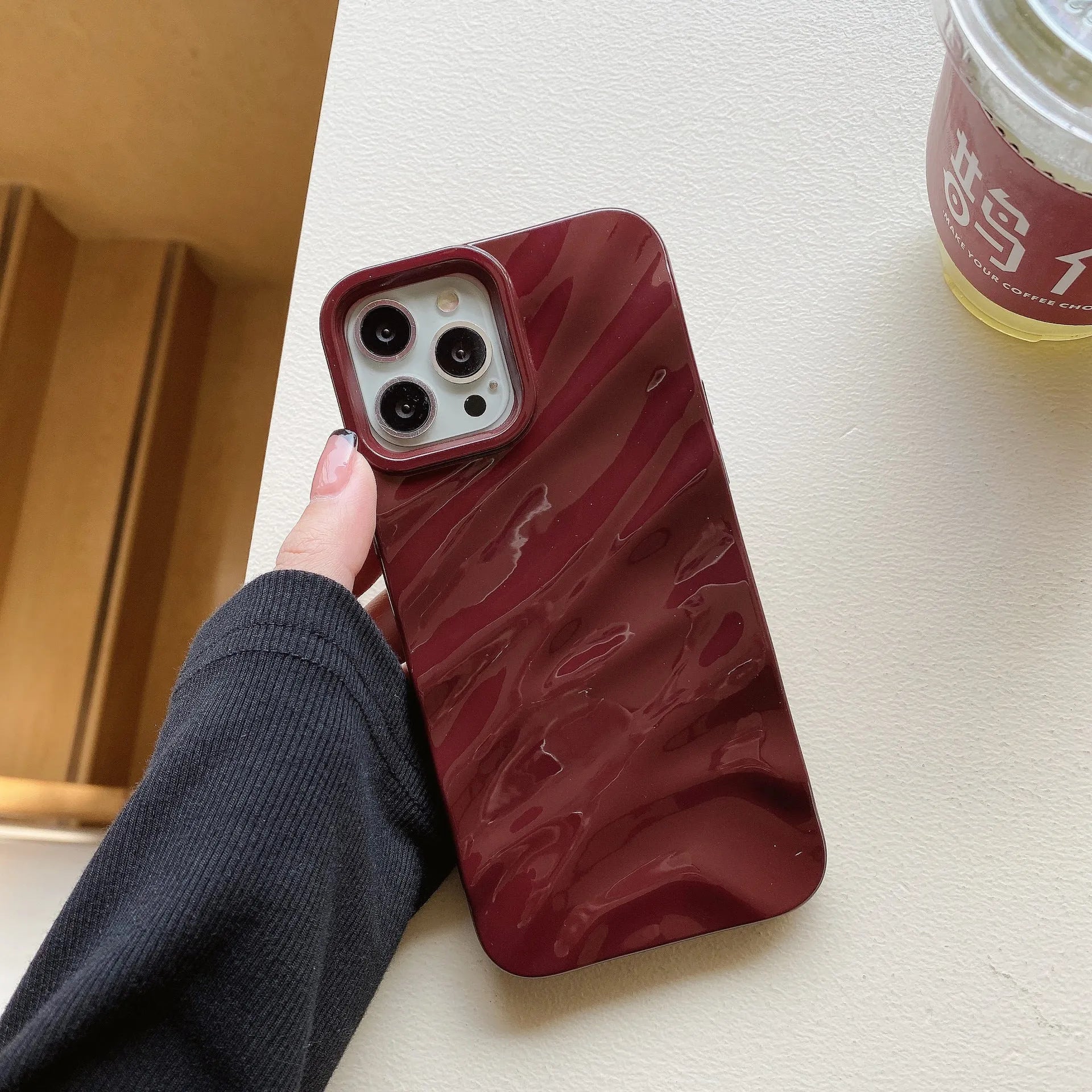 Soft wave pleated TPU phone case for Apple iPhone 17 in a selection of colours including electroplated gold and matte purple.