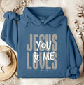 Hooded pullover leisure loose printed sweater in blue with long sleeves and a hood, front view