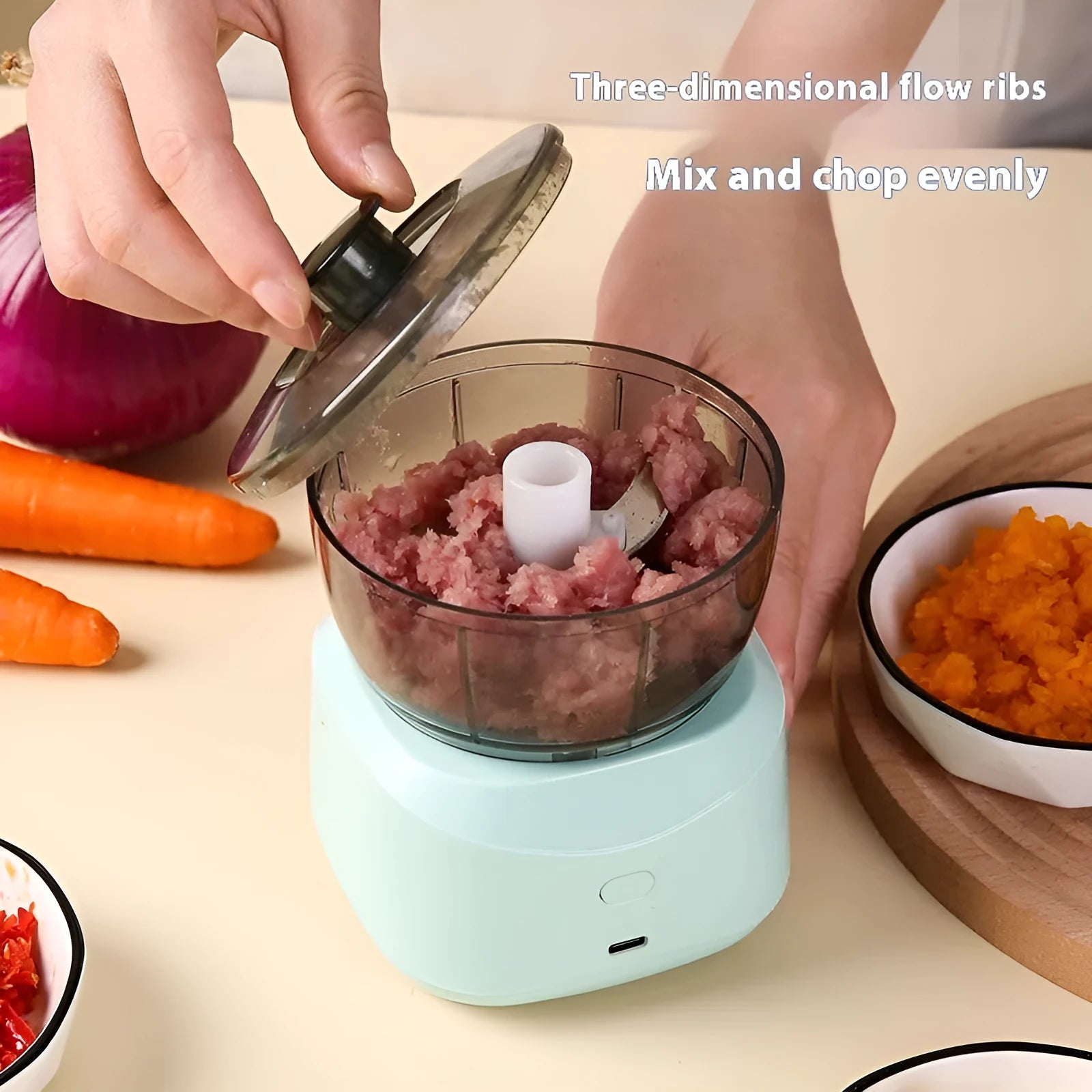 Light blue compact wireless food processor with bowl and blade, 1L capacity, quiet motor