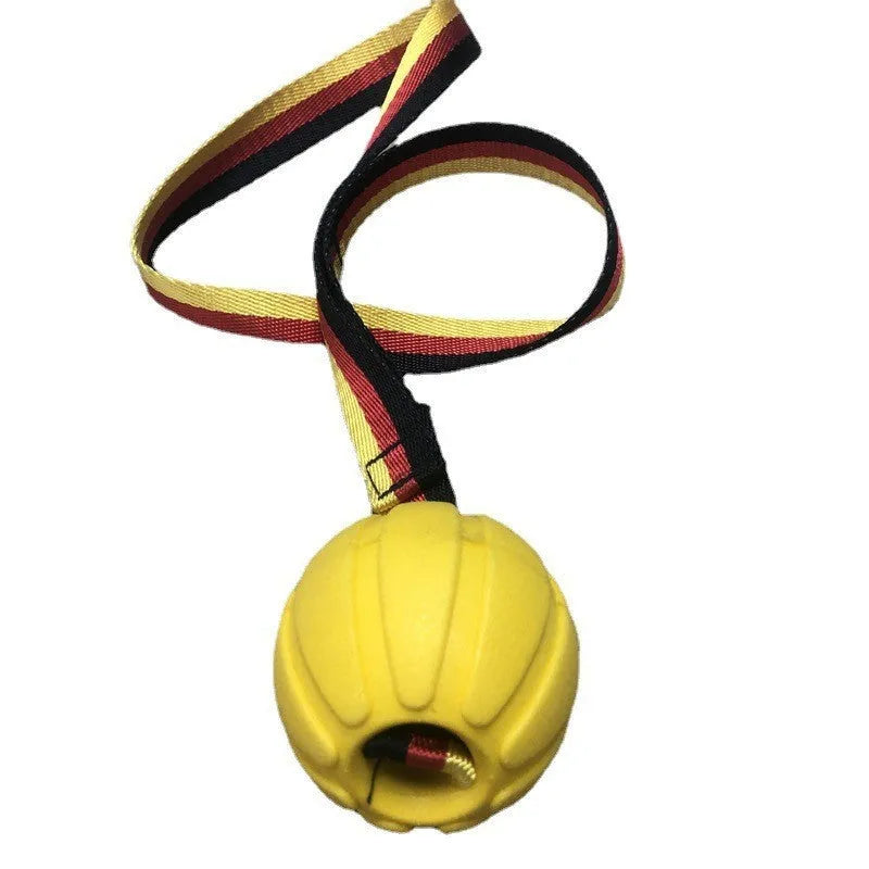 Floating EVA dog training ball with attached string in camouflage and yellow colours, showing three diameter sizes