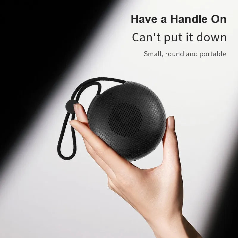 Outdoor portable mini waterproof colourful glowing Bluetooth speaker in black and white options