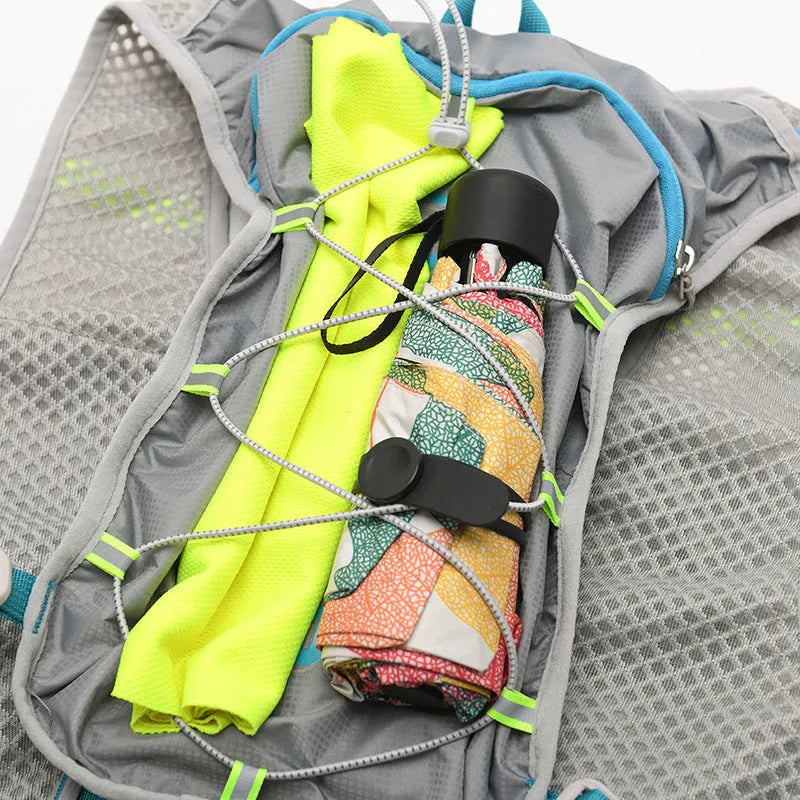 Solid colour nylon running backpack with reflective strips, shown in a light grey option.