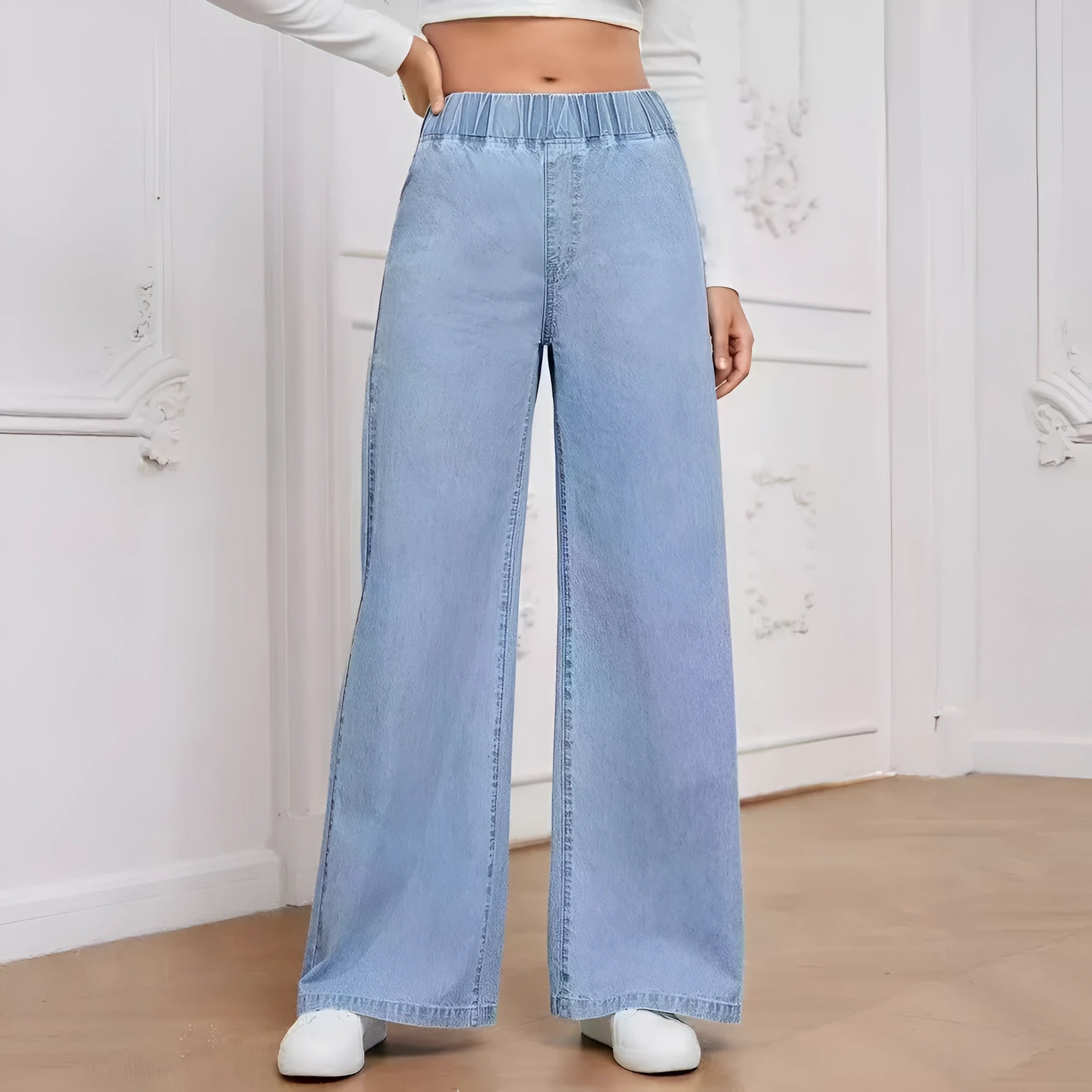 Light blue washed wide-leg plus size jeans with straight cut and zip fly opening