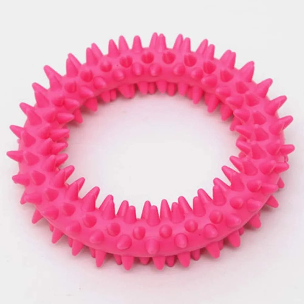 Blue TPR spiky ring dog chew toy for dental cleaning and bite training on a white background.