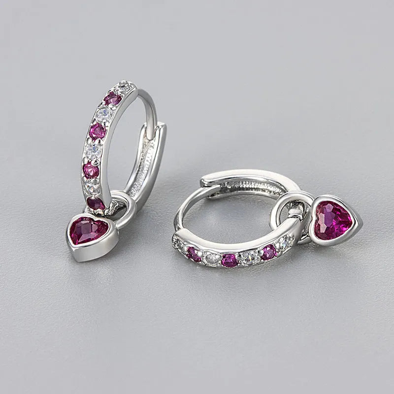 Women's zircon heart drop earrings with coloured stone in gold or white gold colour setting.