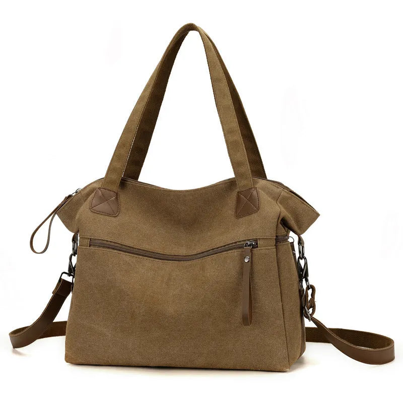 Women's retro style canvas shoulder bag in horizontal square shape with organisational compartments