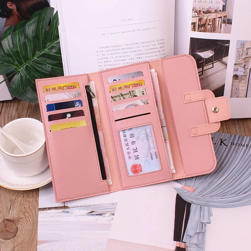 Women's long tri-fold clutch wallet in solid colour with sewing thread detail, PU leather exterior, large capacity