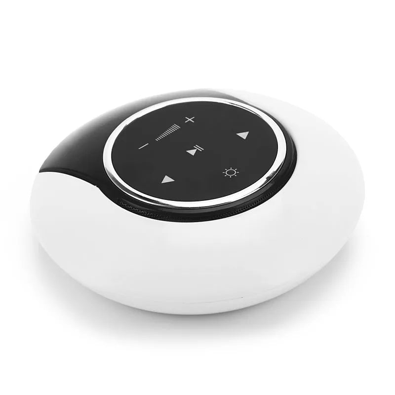 Folding Bluetooth desk lamp and speaker with touch controls showing blue atmospheric LED light.