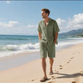Men's white linen blend short sleeve shirt and shorts leisure set laid flat.