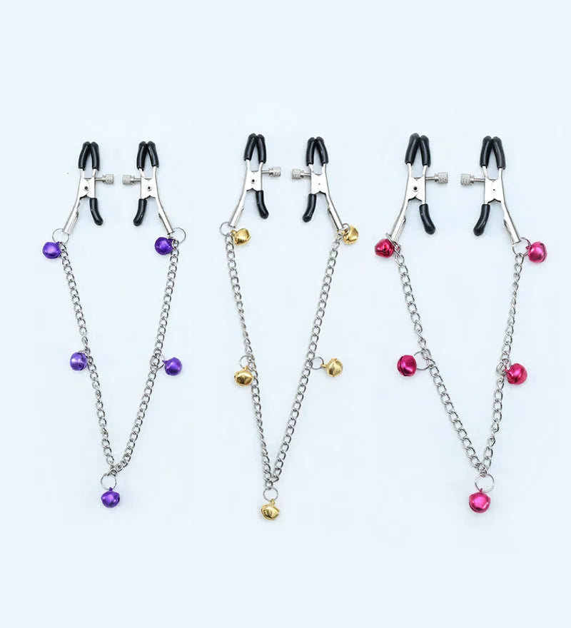 Red single bell nipple clamp pair with reel chain and two gold bells on white background