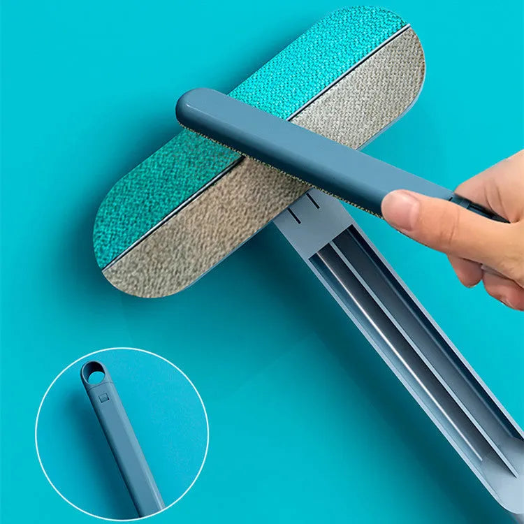 Multifunctional plastic cleaning brush with soft flannel head and extension handle for pet hair and dust.