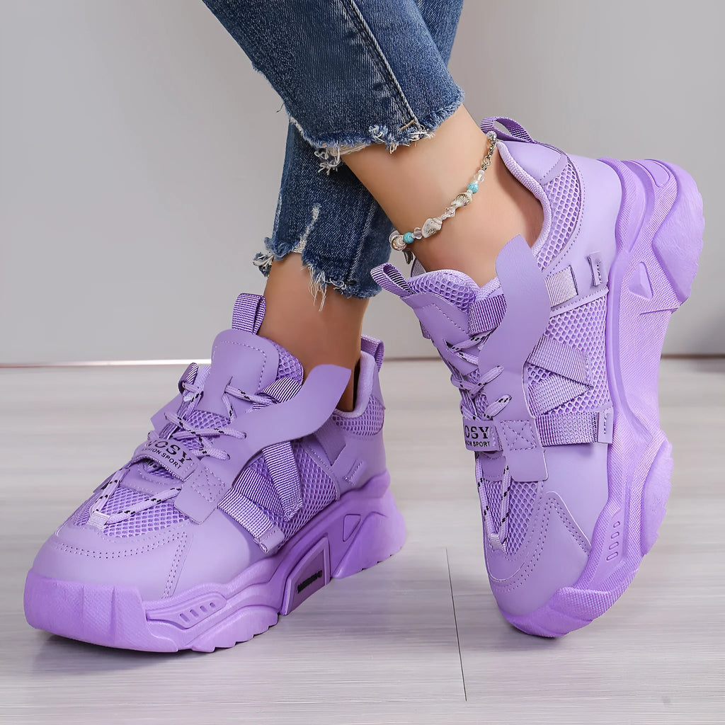 Women's platform mesh dad sneaker in multiple colours with lace-up front and thick sole.