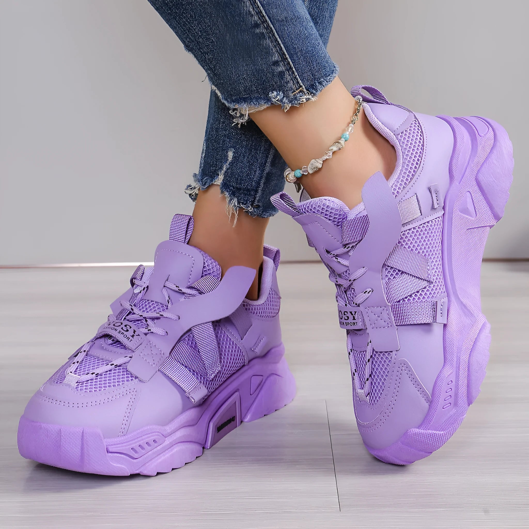 Women's platform mesh dad sneaker in multiple colours with lace-up front and thick sole.