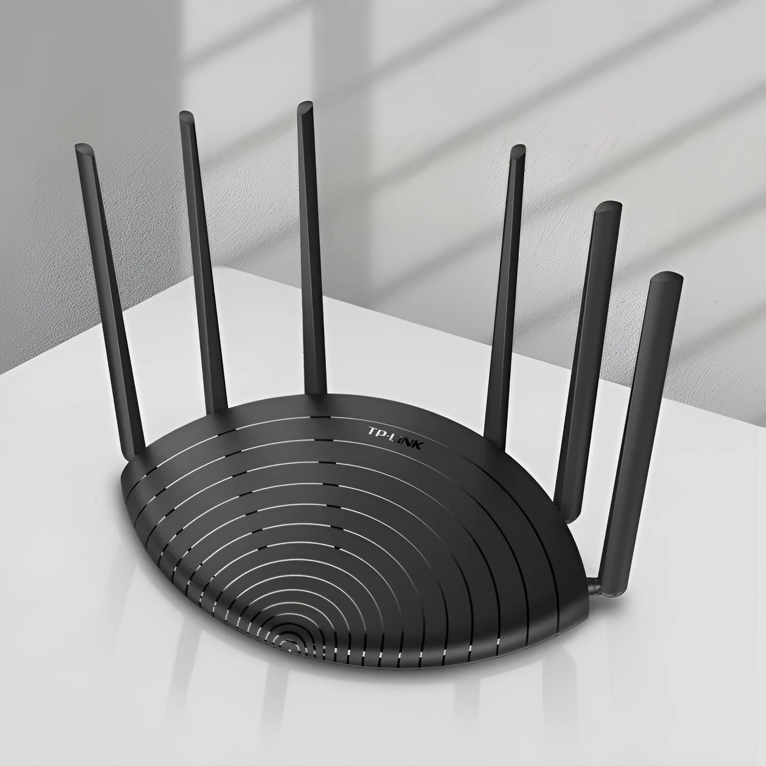 TL-WDR7661 Gigabit Edition AC1900 wireless home router with compact black casing.