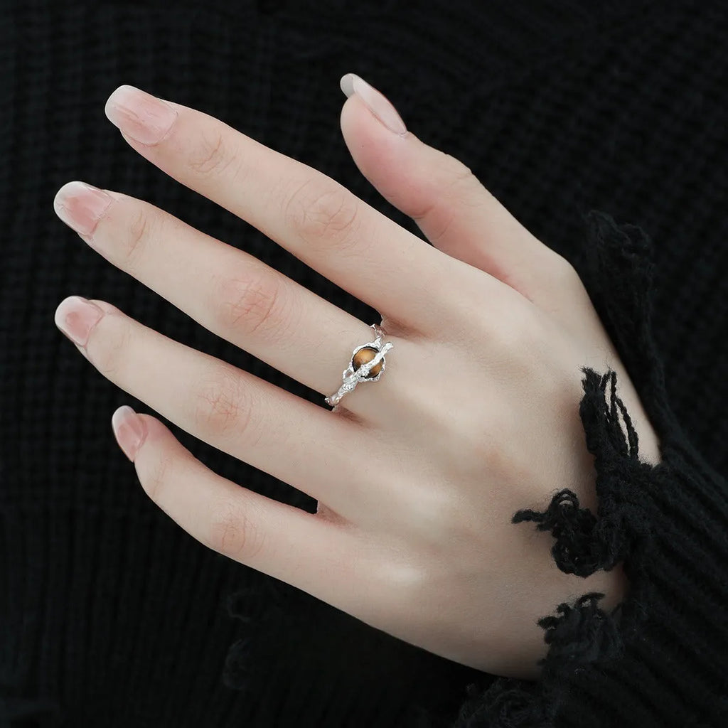 Silver Saturn open ring with tigereye detail and white gold-coloured electroplated finish, adjustable opening