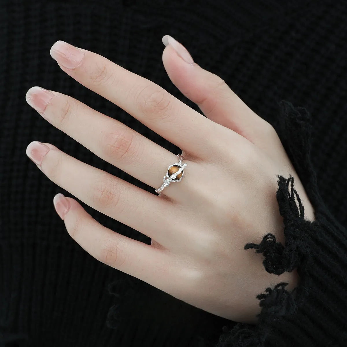 Silver Saturn open ring with tigereye detail and white gold-coloured electroplated finish, adjustable opening