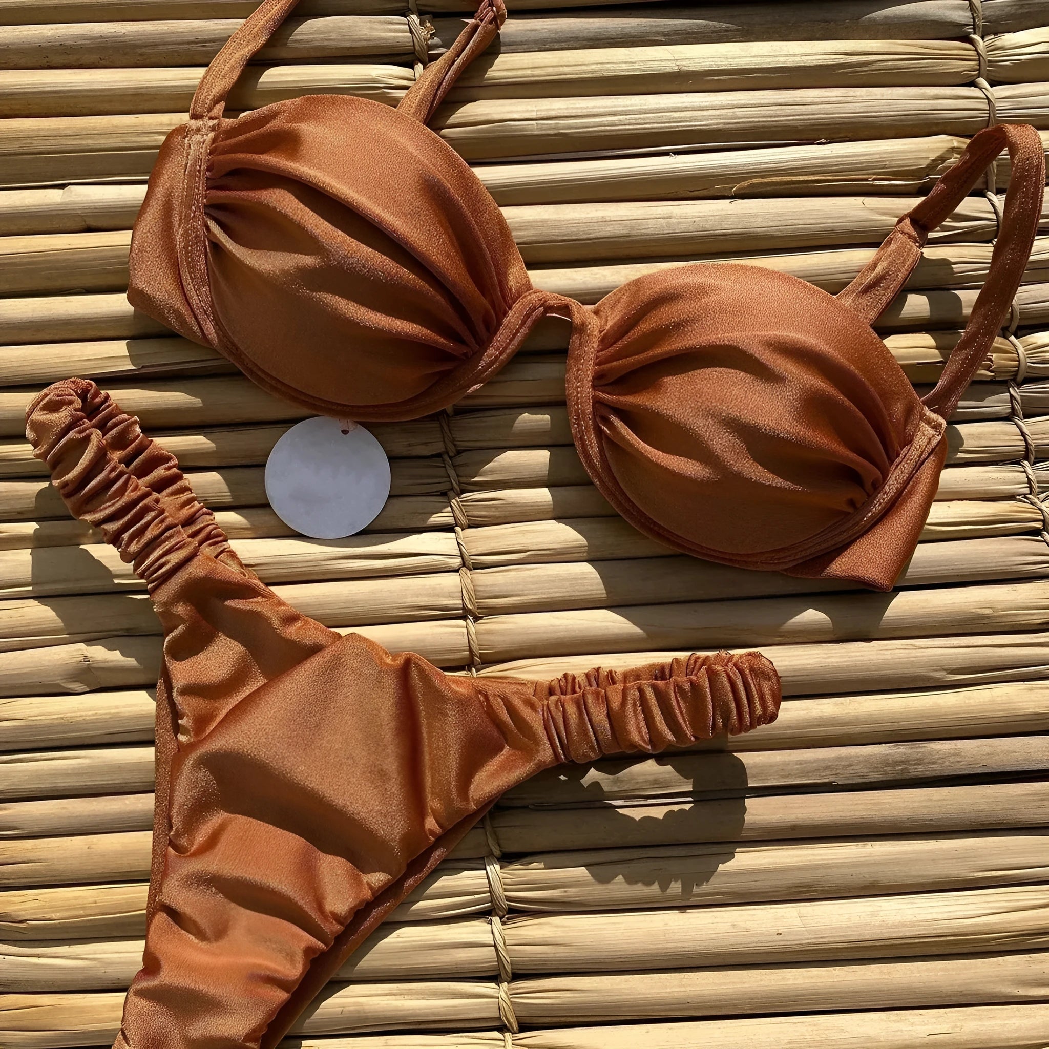 Women's black underwire bikini swimsuit set with high-leg briefs.