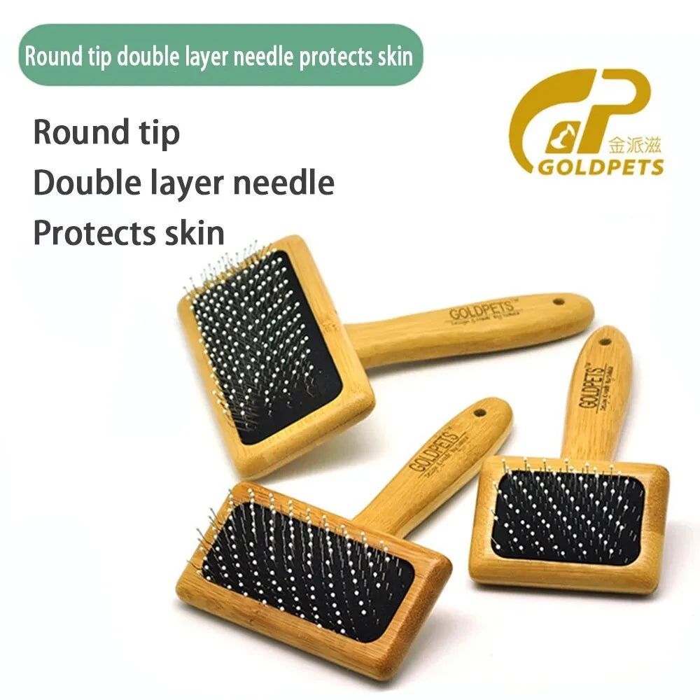 Goldpets bamboo and wood slicker brush for grooming cats and dogs with long prongs.