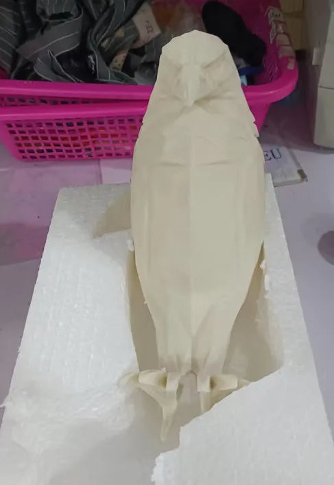 3D print resin wall lamp shaped like an owl projecting light and shadow onto a wall