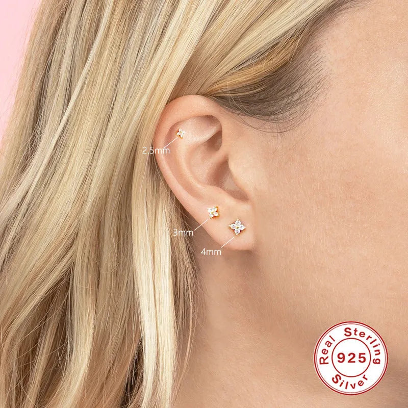 S925 sterling silver geometric petal stud earrings with crystal flowers in gold or platinum plating.