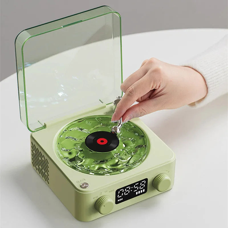 Retro turntable Bluetooth speaker with rotating vinyl and RGB projection lighting effects